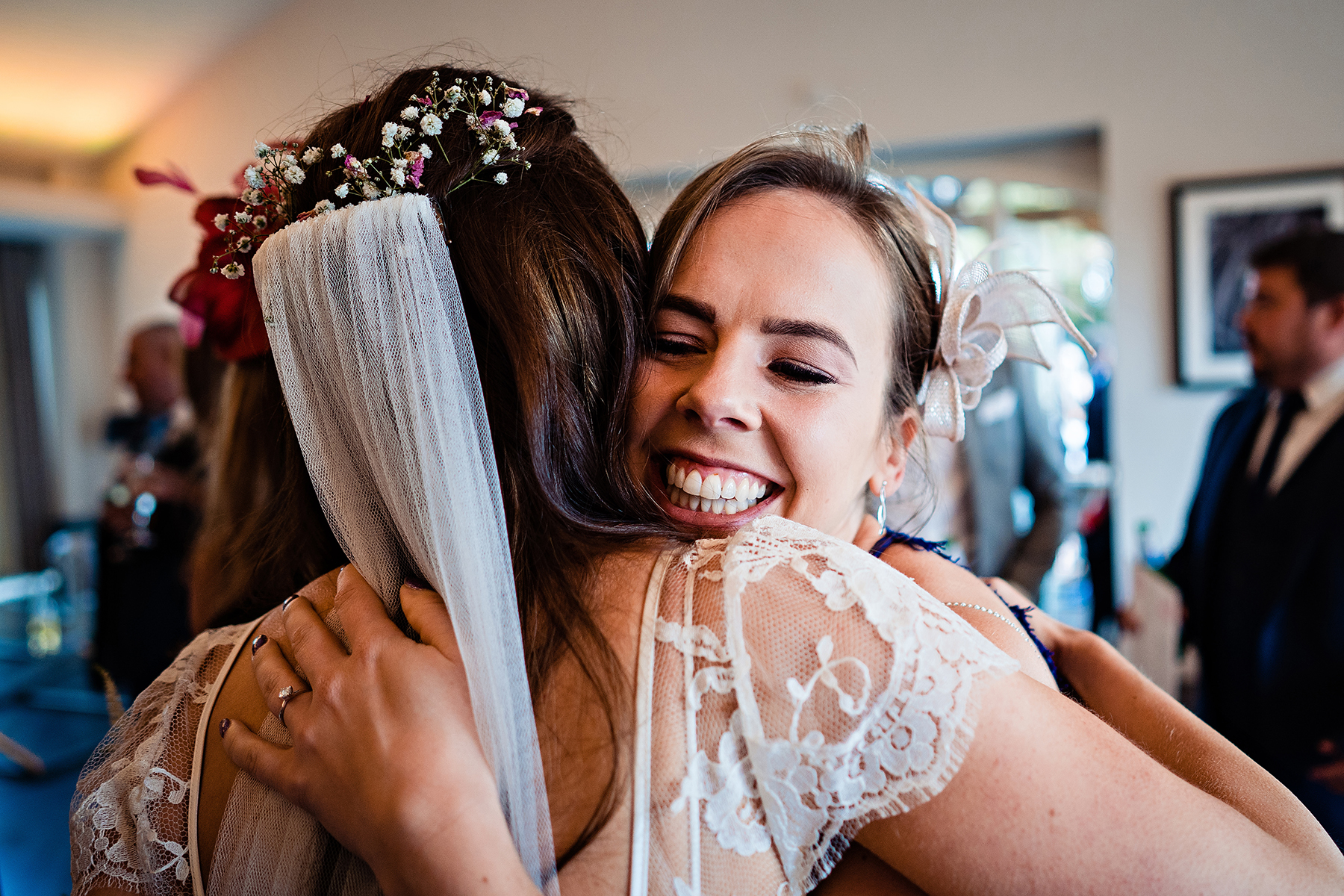 bride hugging a guest