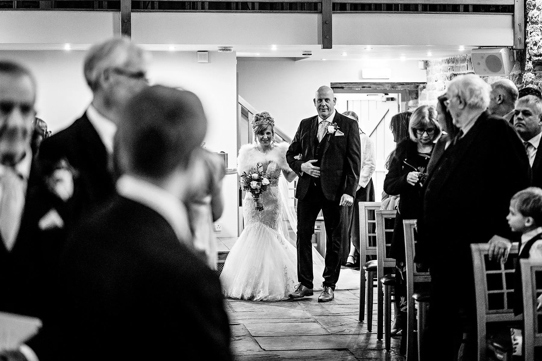 The bride enters the wedding barn